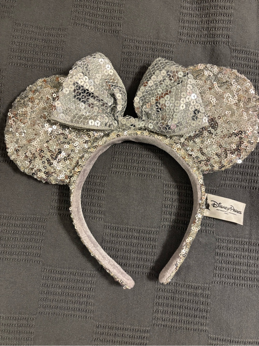 Disney Silver Sequin Minnie Mouse Ear Headband with Bow